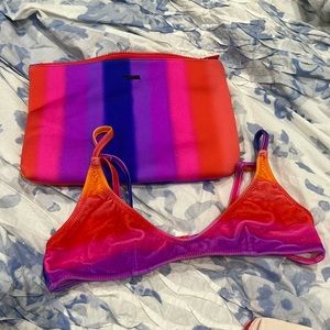 TRIANGL suit in perf condition. small top medium in bottoms. (price negotiable)